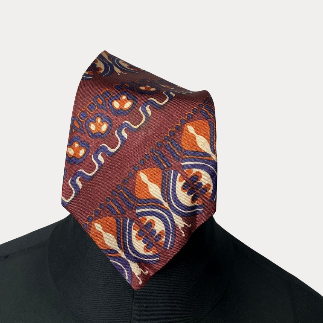 Maroon patterned necktie